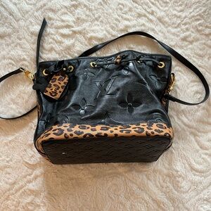 Black purse with Cheetah accents